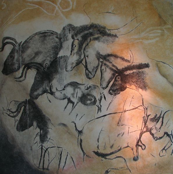 Did the origins of writing show up in cave paintings, like this replica from Chauvet Cave, 30,000 years ago?
